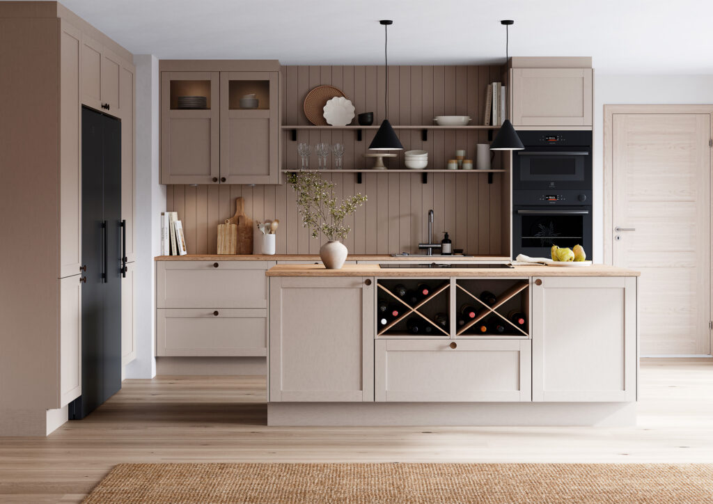 Ett socialt kök i färgen macchiato med köksö