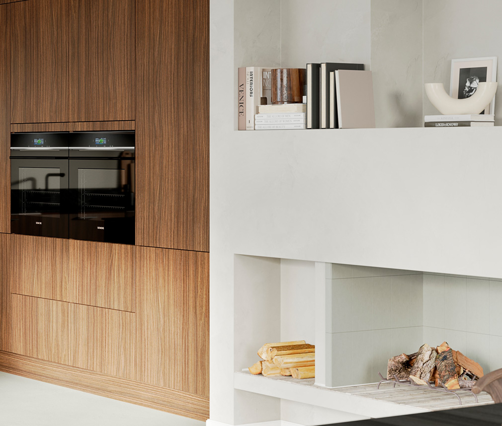 Modernt kök med valnötsluckor, svarta vitvaror och en vit platsbyggd bokhylla